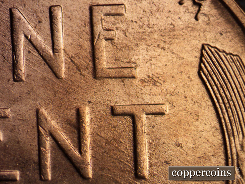 Die-stage B marker on 1956D•1MM•007 (1956 Repunched Mint Mark).