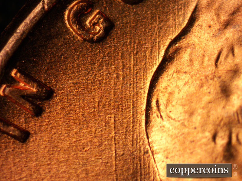 Die-stage B marker on 1956D•1MM•012 (1956 Repunched Mint Mark).