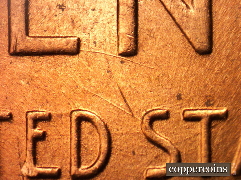 Die-stage B marker on 1956D•1MM•012 (1956 Repunched Mint Mark).
