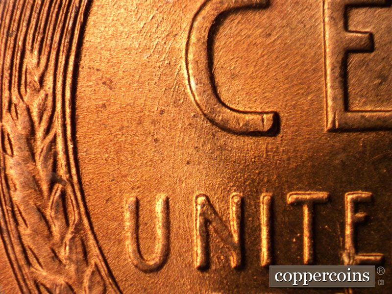 Die-stage B marker on 1956D•1MM•012 (1956 Repunched Mint Mark).