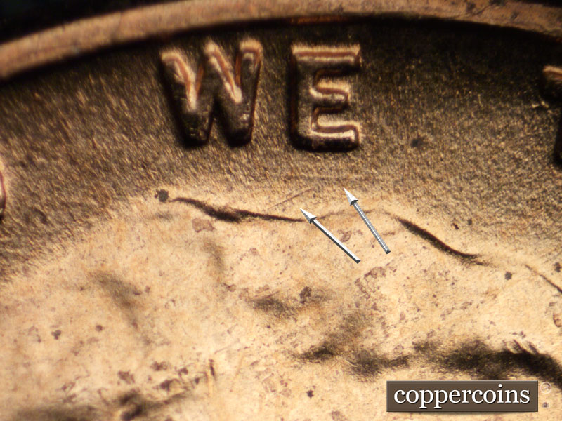Die-stage B marker on 1956D•1MM•013 (1956 Repunched Mint Mark).