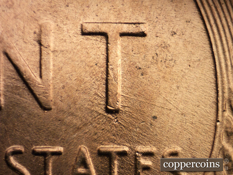 Die-stage B marker on 1956D•1MM•013 (1956 Repunched Mint Mark).