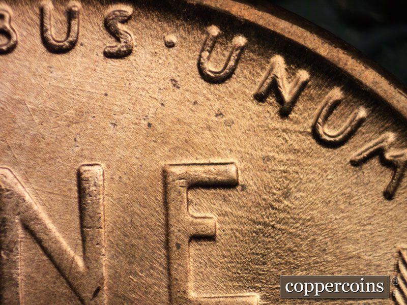 Die-stage B marker on 1956D•1MM•013 (1956 Repunched Mint Mark).