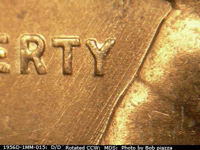 Die-stage B marker on 1956D•1MM•015 (1956 Repunched Mint Mark).