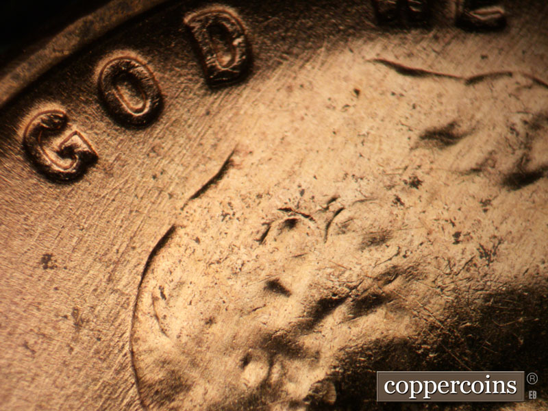 Die-stage B marker on 1956D•1MM•027 (1956 Repunched Mint Mark).