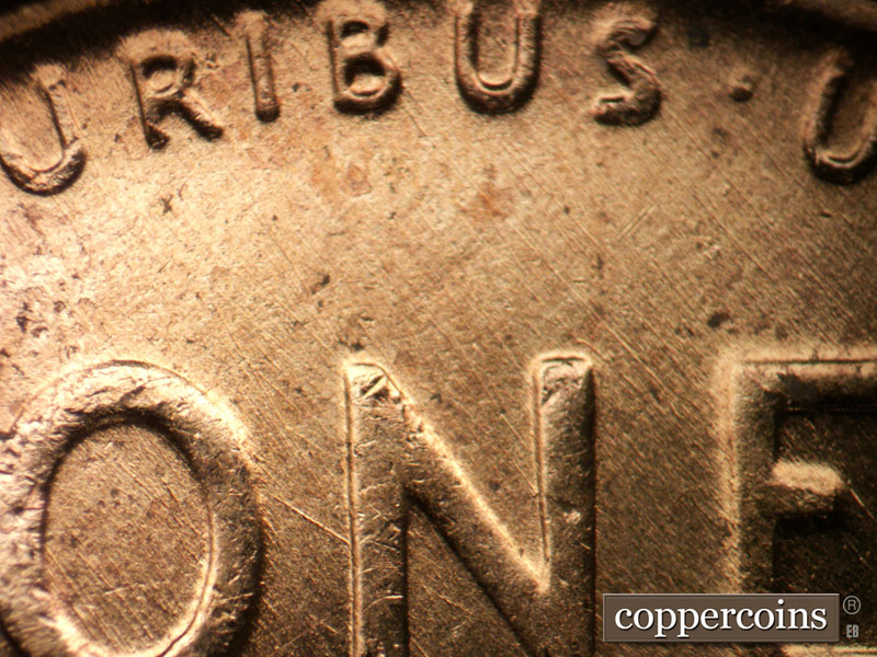 Die-stage B marker on 1956D•1MM•027 (1956 Repunched Mint Mark).