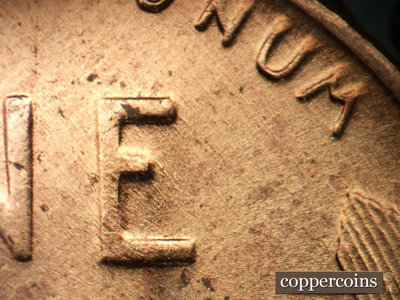 Die-stage B marker on 1956D•1MM•027 (1956 Repunched Mint Mark).