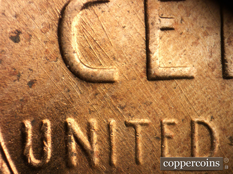 Die-stage B marker on 1956D•1MM•027 (1956 Repunched Mint Mark).