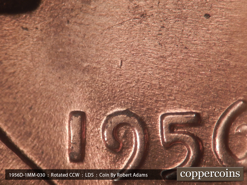 Die-stage C marker on 1956D•1MM•030 showing Die dot above 9 in date.