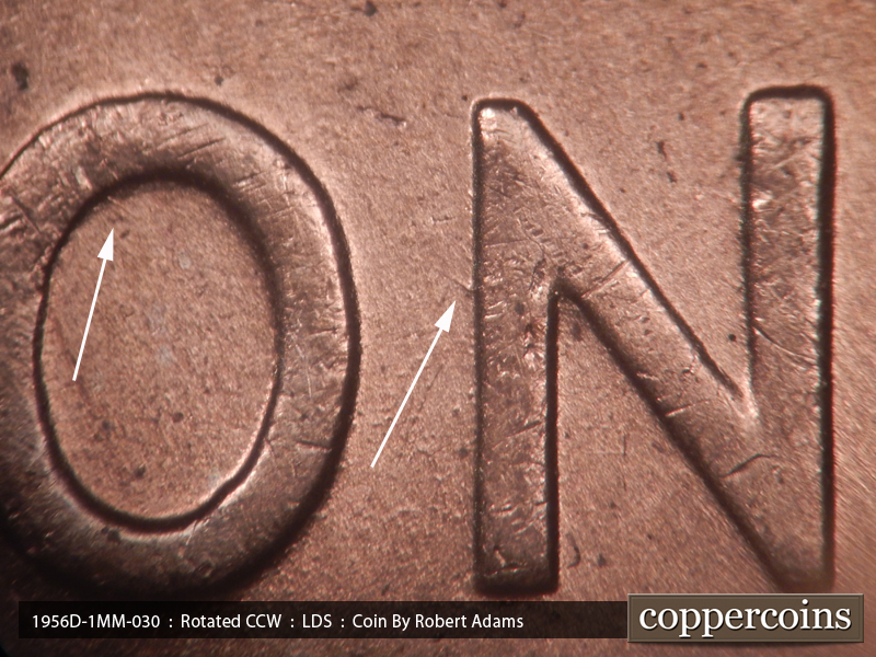 Die-stage C marker on 1956D•1MM•030 showing Short NE die scratch from N in ONE.