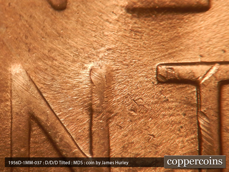 Die-stage B marker on 1956D•1MM•037 (1956 Repunched Mint Mark).