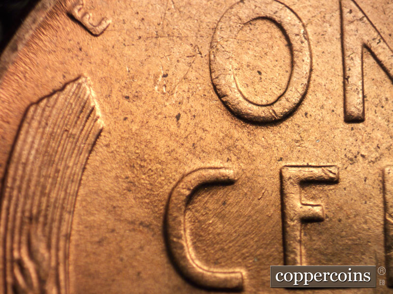 Die-stage B marker on 1956D•1MM•056 (1956 Repunched Mint Mark).