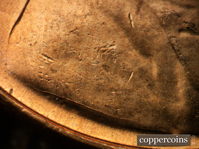 Die-stage B marker on 1956D•1MM•058 (1956 Repunched Mint Mark).