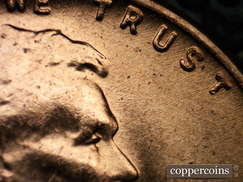 Die-stage B marker on 1956D•1MM•059 (1956 Repunched Mint Mark).