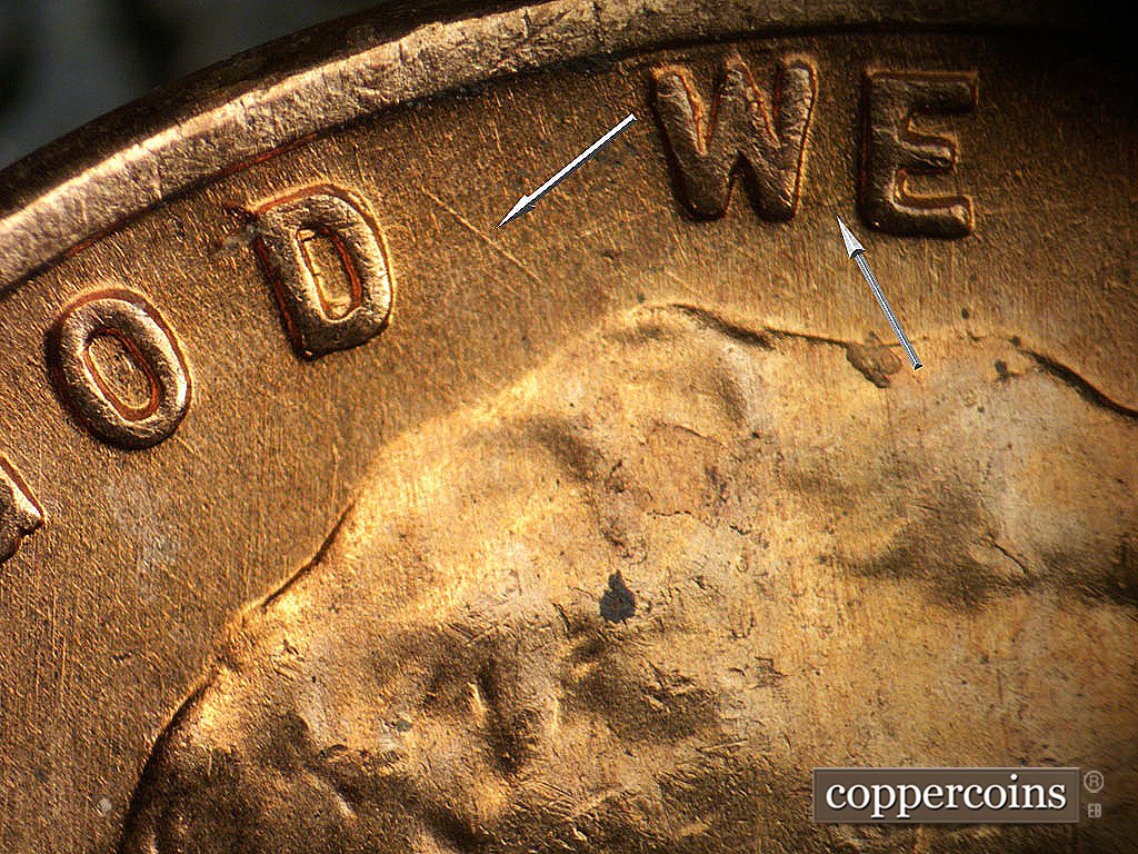 Die-stage A marker on 1956D•1MM•062 showing SE die scratch east of D in GOD, Die scratch connect W to E in WE.