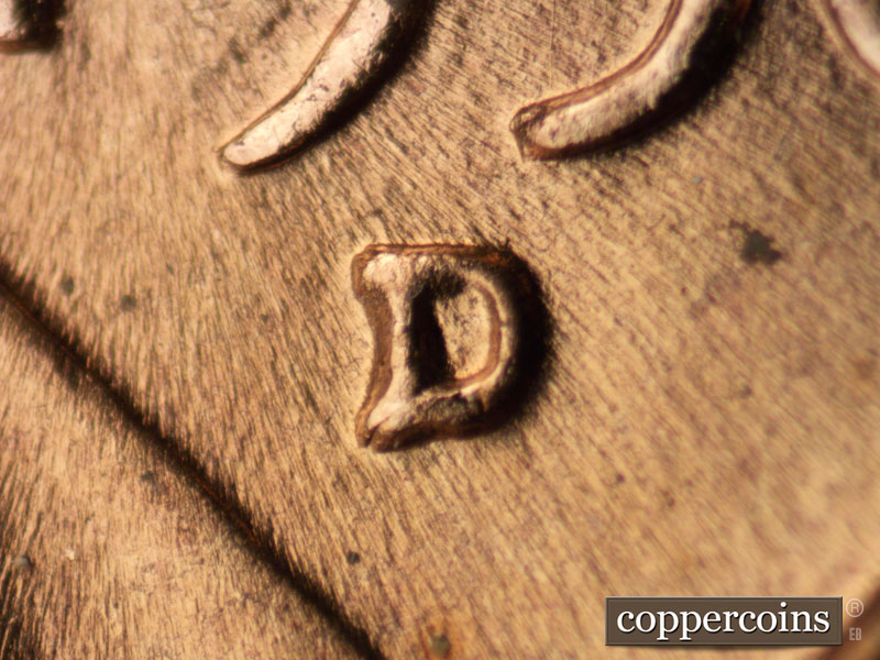 1956 Lincoln cent obverse, CopperCoins die 1956D•1MM•062 — Closeup of mintmark.