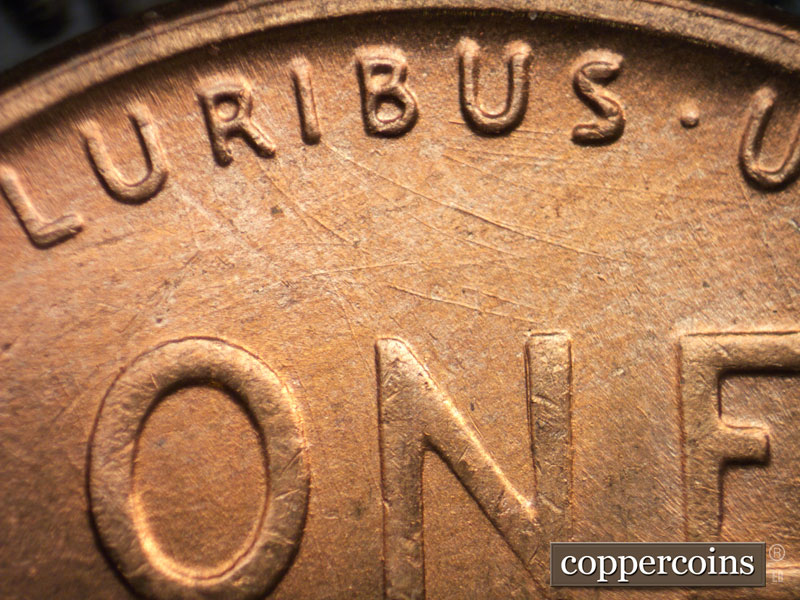 Die-stage B marker on 1956D•1MM•064 (1956 Repunched Mint Mark).