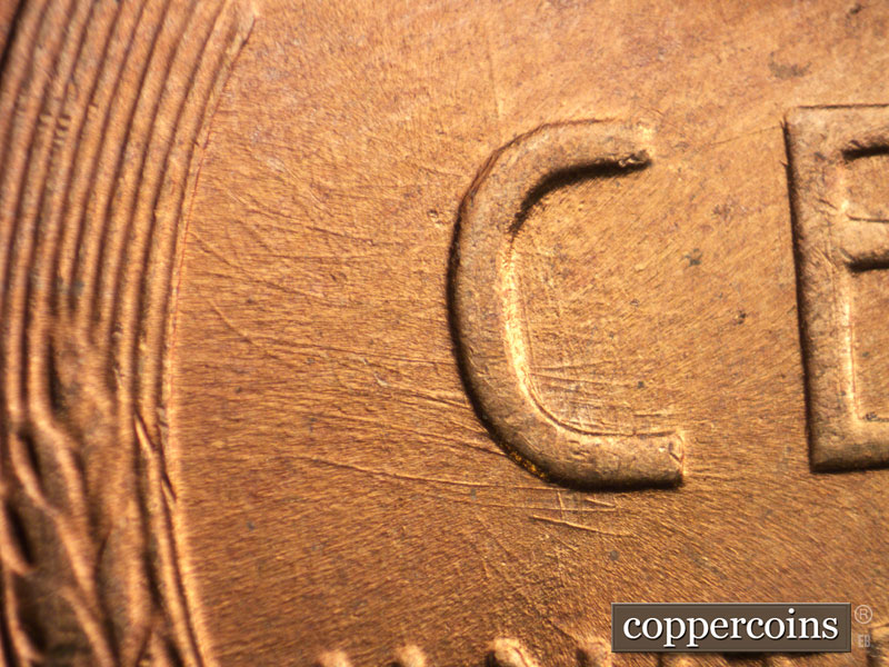 Die-stage B marker on 1956D•1MM•064 (1956 Repunched Mint Mark).