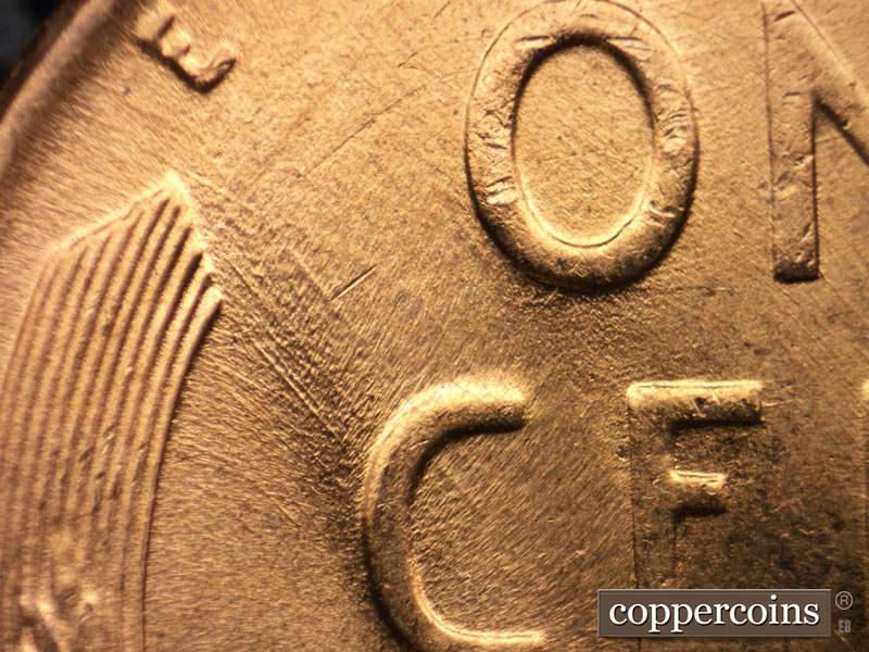 Die-stage B marker on 1956D•1MM•065 (1956 Repunched Mint Mark).