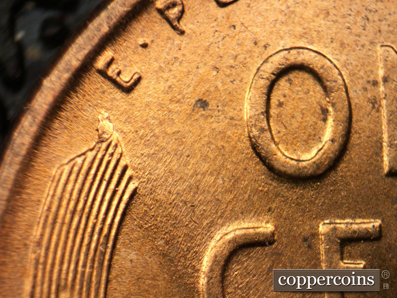 Die-stage B marker on 1956D•1MM•067 (1956 Repunched Mint Mark).