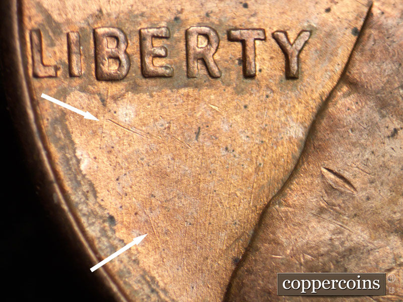 Die-stage B marker on 1956D•1MM•068 (1956 Repunched Mint Mark).