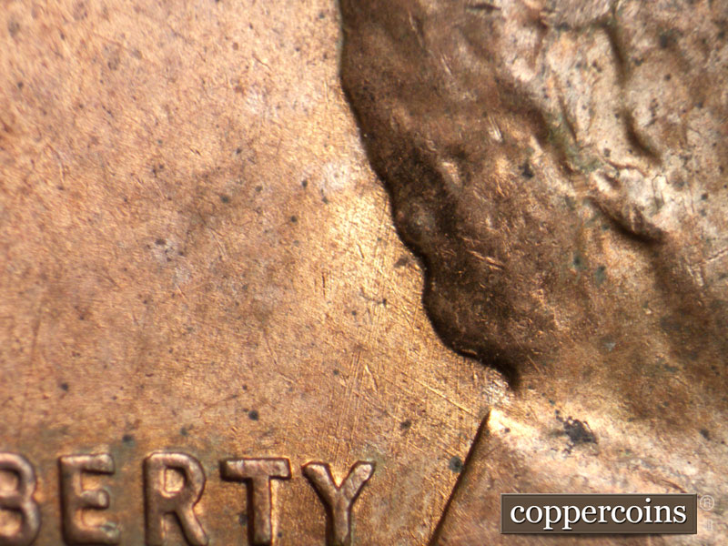 Die-stage B marker on 1956D•1MM•068 (1956 Repunched Mint Mark).