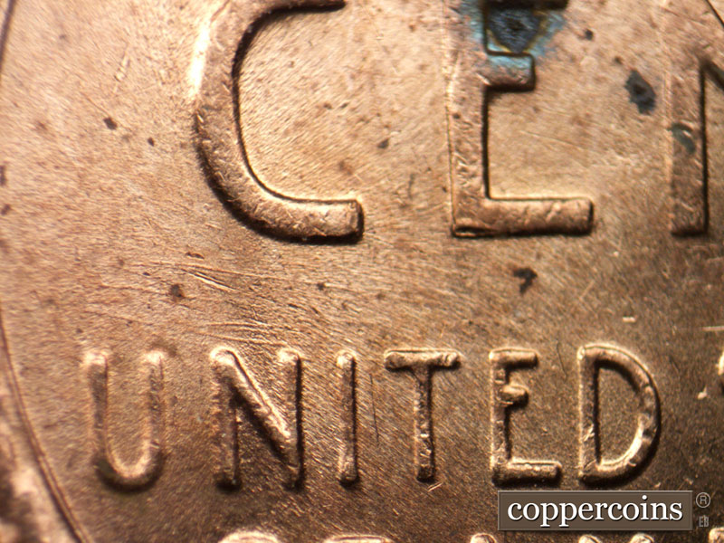Die-stage B marker on 1956D•1MM•068 (1956 Repunched Mint Mark).