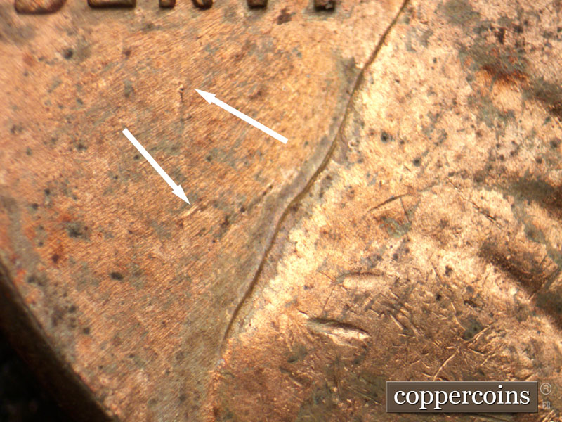 Die-stage B marker on 1956D•1MM•069 (1956 Repunched Mint Mark).