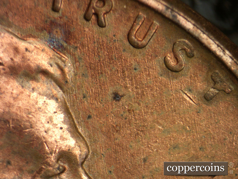 Die-stage B marker on 1956D•1MM•069 (1956 Repunched Mint Mark).