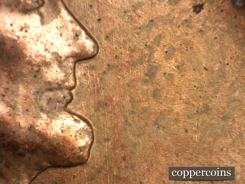 Die-stage B marker on 1956D•1MM•069 (1956 Repunched Mint Mark).
