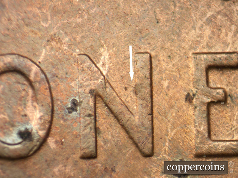 Die-stage B marker on 1956D•1MM•069 (1956 Repunched Mint Mark).