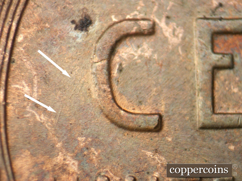 Die-stage B marker on 1956D•1MM•069 (1956 Repunched Mint Mark).