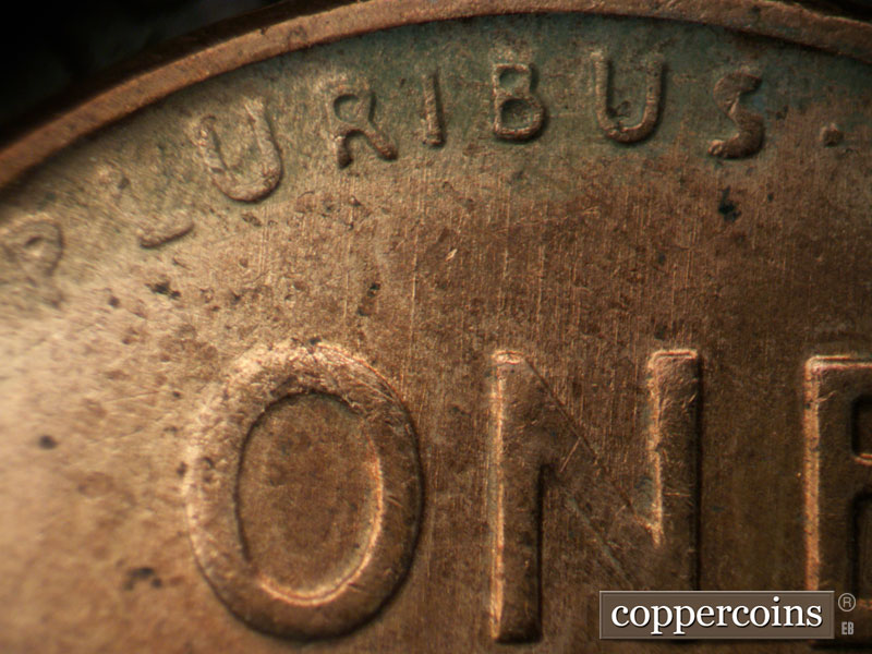 Die-stage B marker on 1956D•1MM•071 (1956 Repunched Mint Mark).