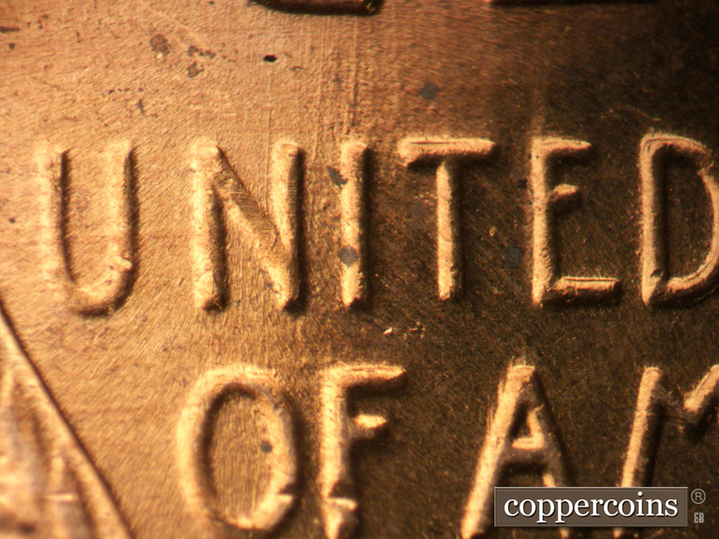 Die-stage B marker on 1956D•1MM•072 (1956 Repunched Mint Mark).