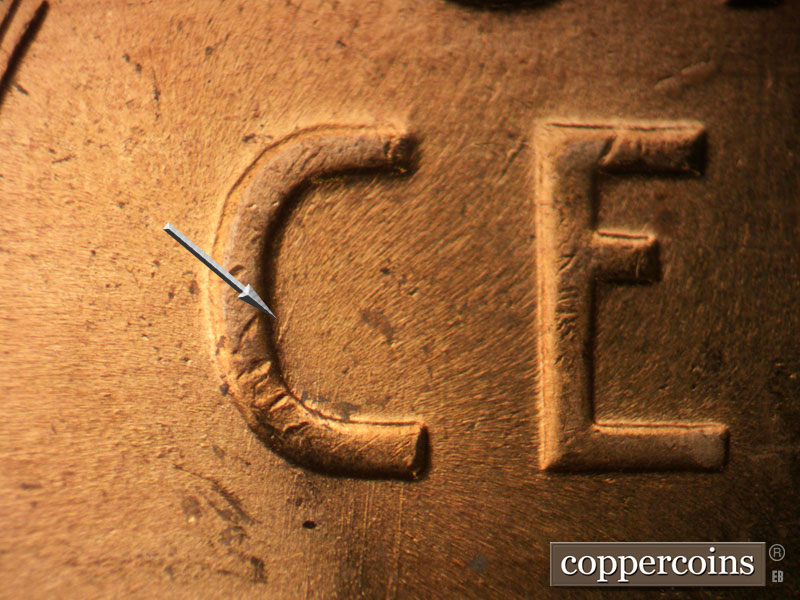 Die-stage B marker on 1956D•1MM•072 (1956 Repunched Mint Mark).