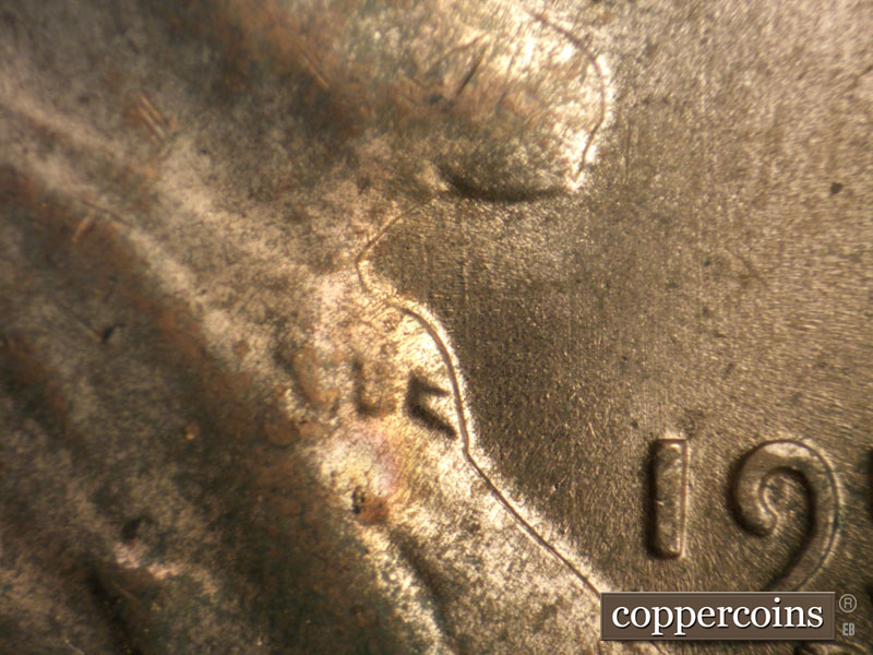 Die-stage B marker on 1956D•1MM•073 (1956 Repunched Mint Mark).