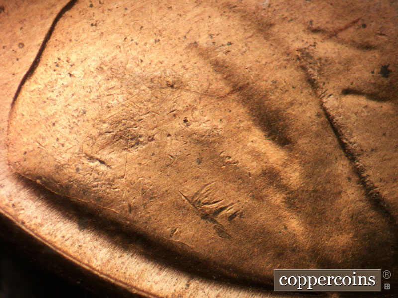 Die-stage B marker on 1956D•1MM•074 (1956 Repunched Mint Mark).