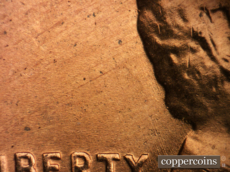 Die-stage B marker on 1956D•1MM•074 (1956 Repunched Mint Mark).