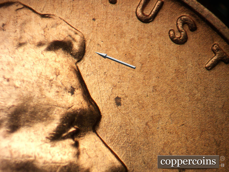 Die-stage B marker on 1956D•1MM•079 (1956 Repunched Mint Mark).