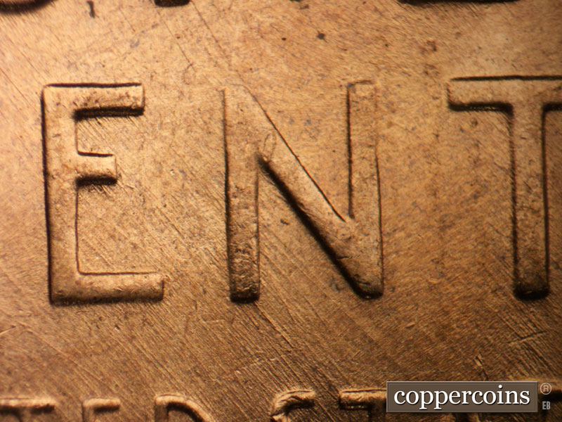 Die-stage B marker on 1956D•1MM•079 (1956 Repunched Mint Mark).