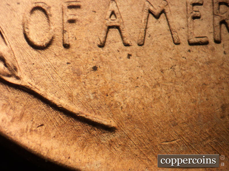 Die-stage B marker on 1956D•1MM•079 (1956 Repunched Mint Mark).
