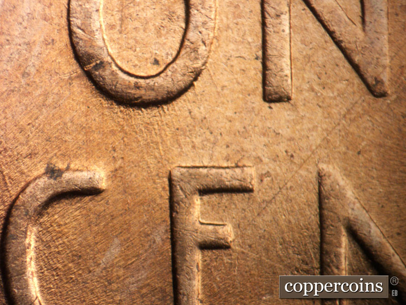 Die-stage B marker on 1956D•1MM•081 (1956 Repunched Mint Mark).