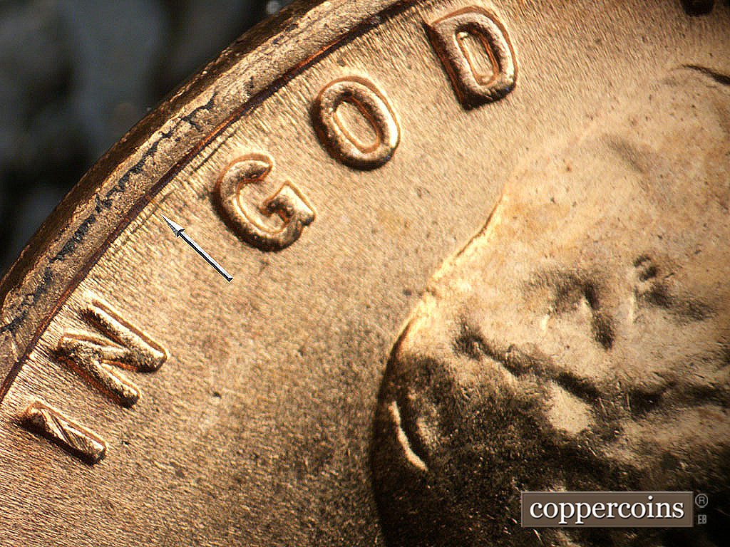 Die-stage B marker on 1956D•1MM•085 showing Concentric gouge between rim and GOD WE.