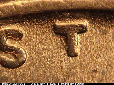 Die-stage C marker on 1956D•1OM•001 (1956 Over Mint Mark).