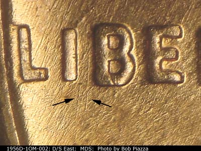 Die-stage B marker on 1956D•1OM•002 (1956 Over Mint Mark).