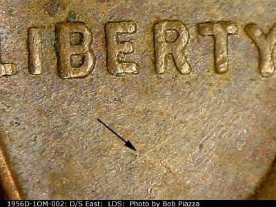 Die-stage C marker on 1956D•1OM•002 (1956 Over Mint Mark).
