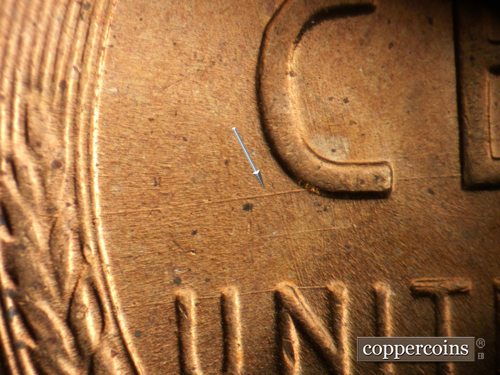 Die-stage B marker on 1956P•1DO•008 showing E/W die scratch through bottom of C in CENT.