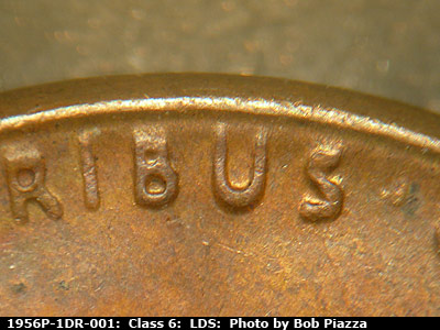 Die-stage C marker on 1956P•1DR•001 (1956 Doubled Die Reverse).