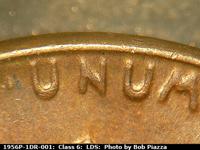 Die-stage C marker on 1956P•1DR•001 (1956 Doubled Die Reverse).