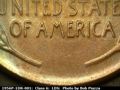 Die-stage C marker on 1956P•1DR•001 (1956 Doubled Die Reverse).